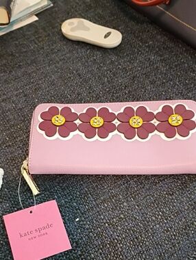 kate spade pink floral zip-around wallet with purple flower appliqués